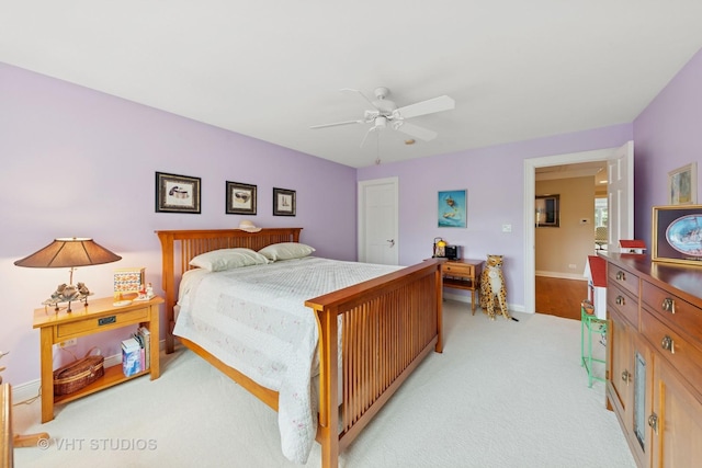 21819 W Riviera Ct, Mundelein, IL 60060 - bedroom featuring light carpet, baseboards, and a ceiling fan