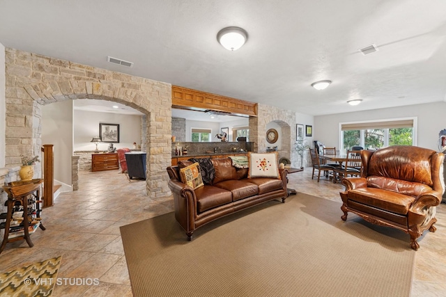 21819 W Riviera Ct, Mundelein, IL 60060 - living area with arched walkways and visible vents