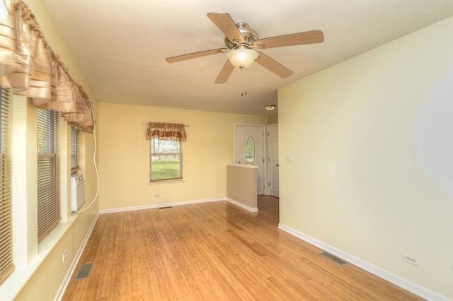 2816 Stilling Blvd, Mchenry, IL 60050 - spare room featuring light wood-style flooring, a ceiling fan, and baseboards