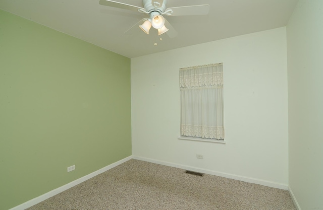 2816 Stilling Blvd, Mchenry, IL 60050 - spare room featuring carpet, baseboards, and a ceiling fan