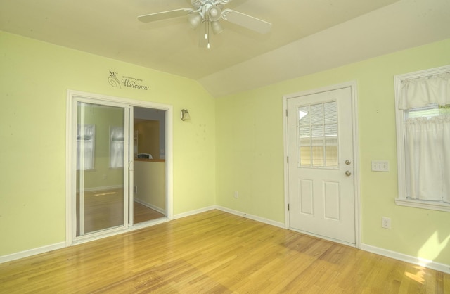 2816 Stilling Blvd, Mchenry, IL 60050 - unfurnished room with a ceiling fan, light wood finished floors, baseboards, and vaulted ceiling