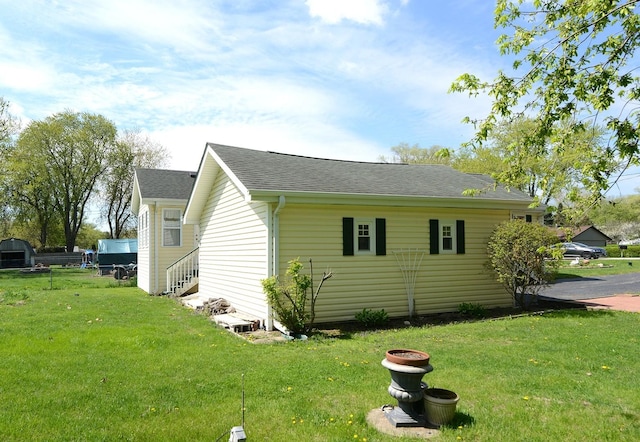 2816 Stilling Blvd, Mchenry, IL 60050 - view of side of home featuring a lawn and a shingled roof