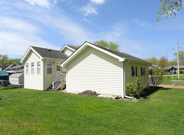 2816 Stilling Blvd, Mchenry, IL 60050 - view of side of home featuring a lawn and roof with shingles