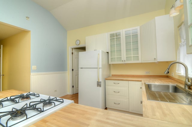2816 Stilling Blvd, Mchenry, IL 60050 - kitchen featuring freestanding refrigerator, a sink, wooden counters, wainscoting, and cooktop