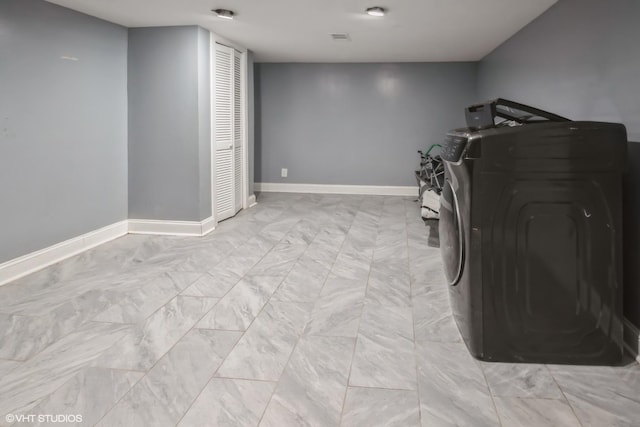 laundry room featuring marble finish floor, baseboards, visible vents, and laundry area