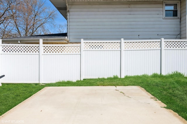 view of patio / terrace featuring fence