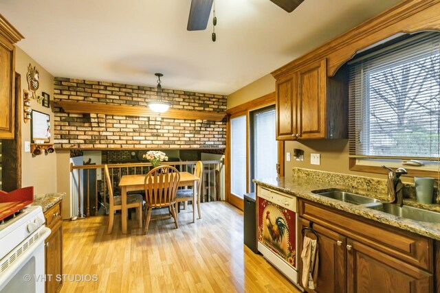 1127 Alpine Ln, Lemont, IL 60439 - kitchen featuring a sink, a ceiling fan, light wood-type flooring, and dishwashing machine