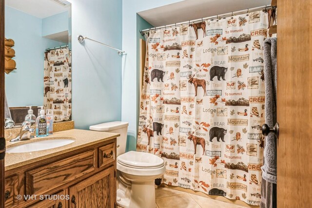 1127 Alpine Ln, Lemont, IL 60439 - bathroom featuring vanity, tile patterned flooring, toilet, and curtained shower