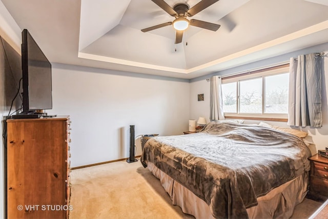 1127 Alpine Ln, Lemont, IL 60439 - bedroom featuring baseboards, light carpet, ceiling fan, and a raised ceiling