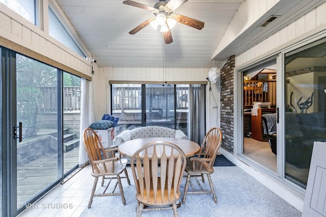 1127 Alpine Ln, Lemont, IL 60439 - sunroom with ceiling fan, outdoor dining area, and visible vents