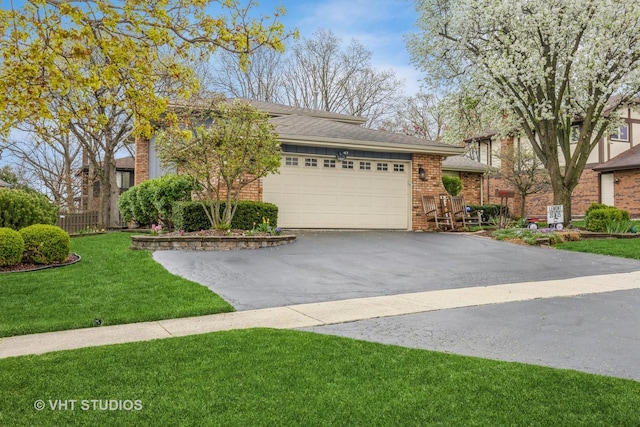 1127 Alpine Ln, Lemont, IL 60439 - view of front facade with brick siding, a garage, a front lawn, and driveway