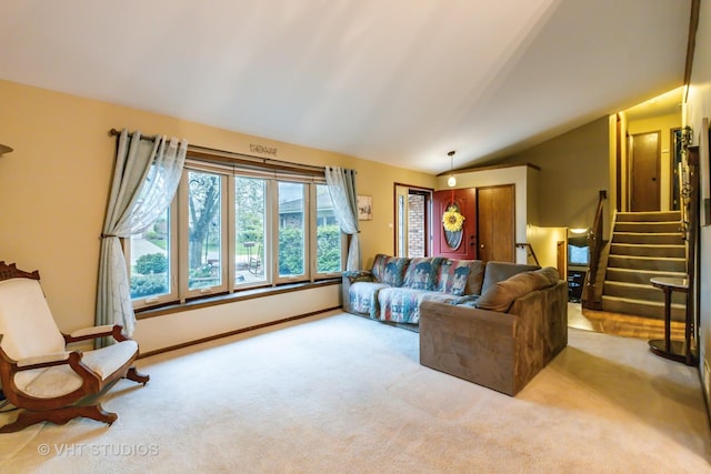 1127 Alpine Ln, Lemont, IL 60439 - carpeted living room featuring stairway and lofted ceiling