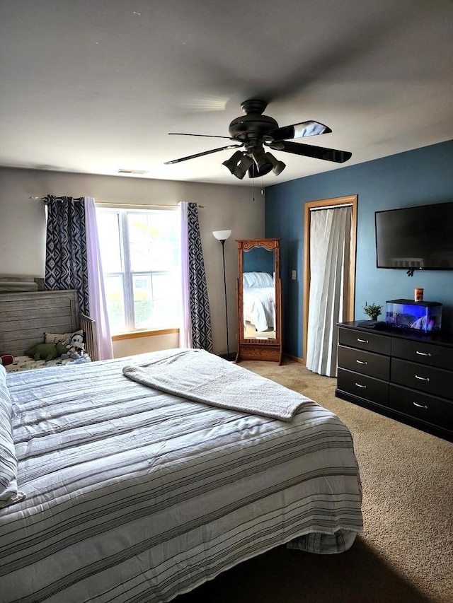 119 Oak Knoll Ct, Volo, IL 60020 - bedroom with light colored carpet and ceiling fan