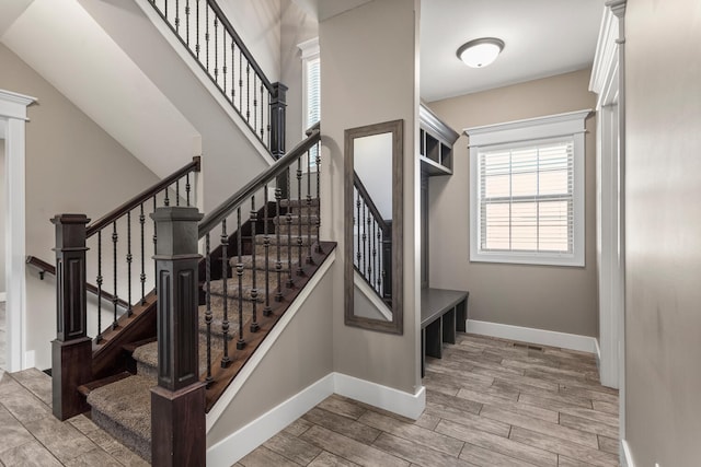 1101 Cascade Dr, Savoy, IL 61874 - stairs with plenty of natural light and wood finished floors