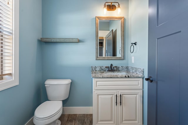 1101 Cascade Dr, Savoy, IL 61874 - bathroom with wood finished floors and vanity