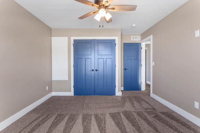 1101 Cascade Dr, Savoy, IL 61874 - unfurnished bedroom with carpet floors, a closet, and ceiling fan