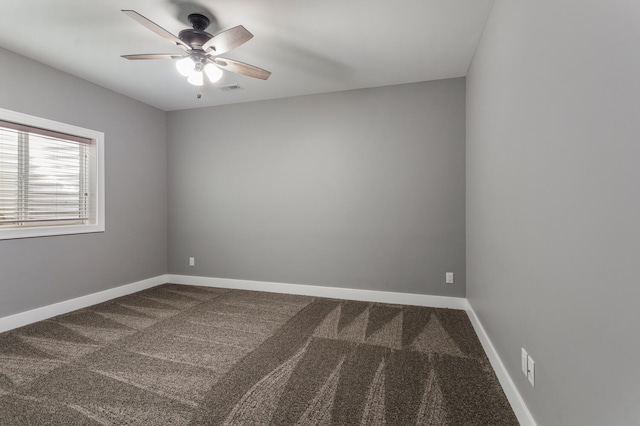 1101 Cascade Dr, Savoy, IL 61874 - carpeted spare room featuring ceiling fan and baseboards