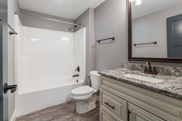 1101 Cascade Dr, Savoy, IL 61874 - bathroom featuring vanity, wood finished floors, and tub / shower combination