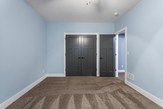 1101 Cascade Dr, Savoy, IL 61874 - unfurnished bedroom featuring carpet and a closet