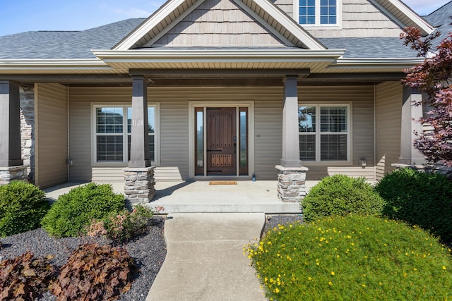1101 Cascade Dr, Savoy, IL 61874 - property entrance with covered porch and a shingled roof