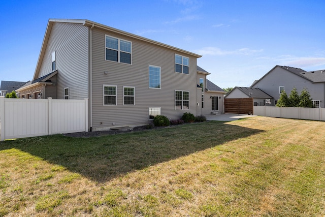 1101 Cascade Dr, Savoy, IL 61874 - back of property featuring a fenced backyard and a patio area