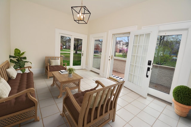 1005 Hovey Ave, Normal, IL 61761 - sunroom / solarium featuring a healthy amount of sunlight and a notable chandelier