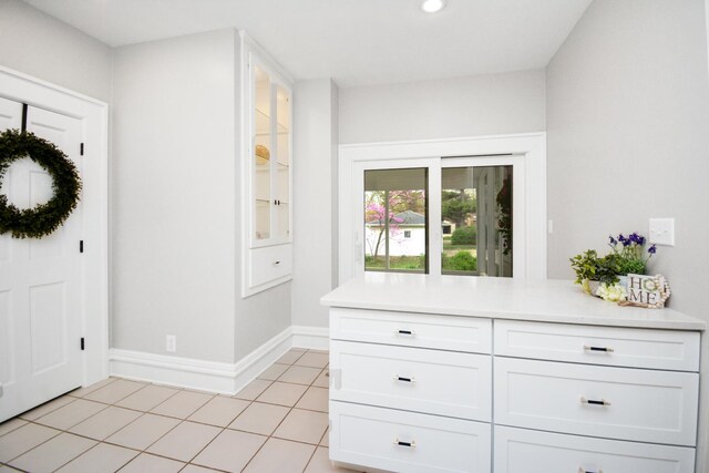 1005 Hovey Ave, Normal, IL 61761 - bar featuring baseboards, recessed lighting, and light tile patterned flooring