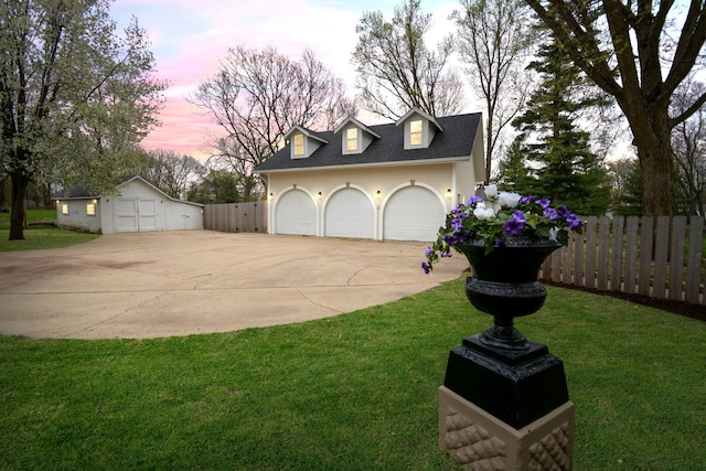 1005 Hovey Ave, Normal, IL 61761 - exterior space featuring fence, an outbuilding, and a yard