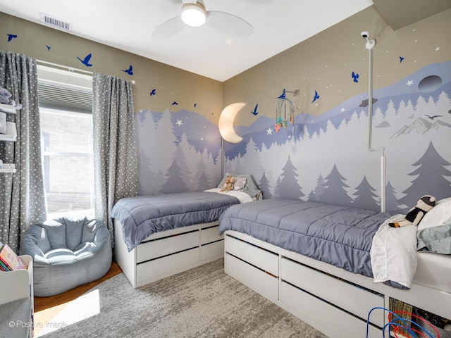 bedroom with a ceiling fan and visible vents