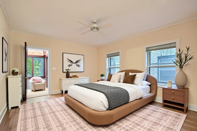 1331 W Greenleaf Ave Unit 2, Chicago, IL 60626 - bedroom with wood finished floors, ornamental molding, baseboards, and ceiling fan