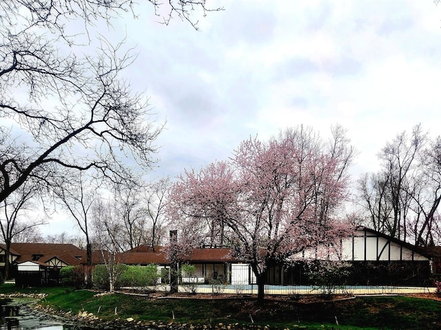 view of side of property with fence