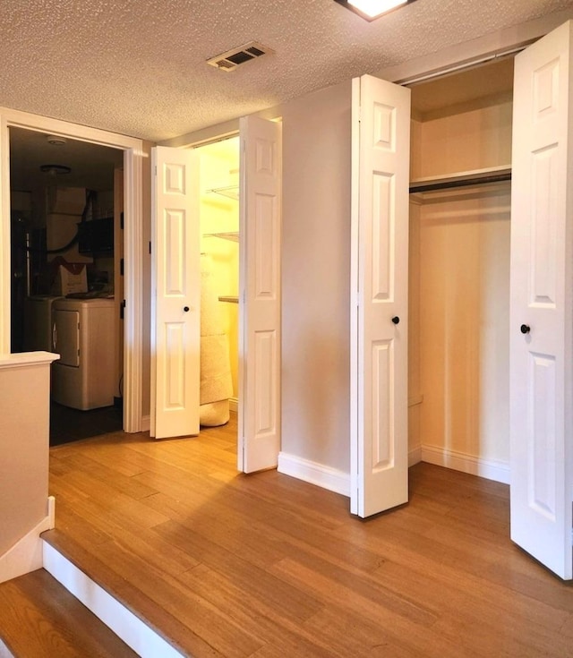 closet with washing machine and dryer