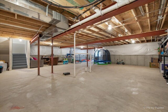 unfinished basement with stairway