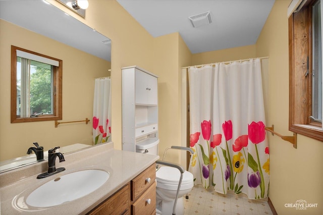 1231 Anthony Ln, Sandwich, IL 60548 - full bathroom with toilet, tile patterned floors, vanity, and a shower with curtain