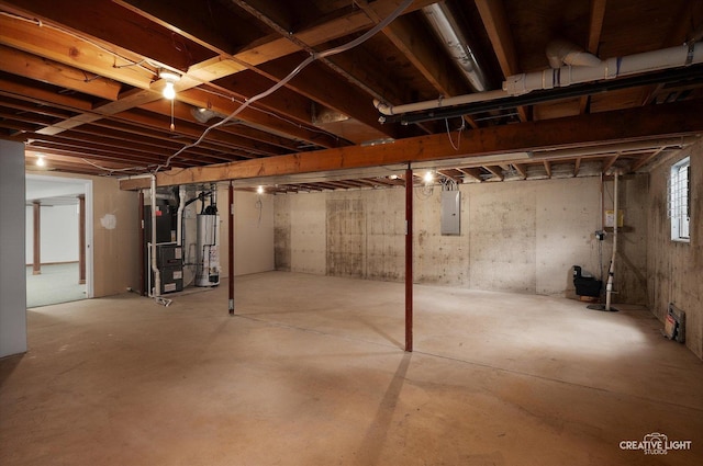 1231 Anthony Ln, Sandwich, IL 60548 - below grade area with electric panel, heating unit, and water heater