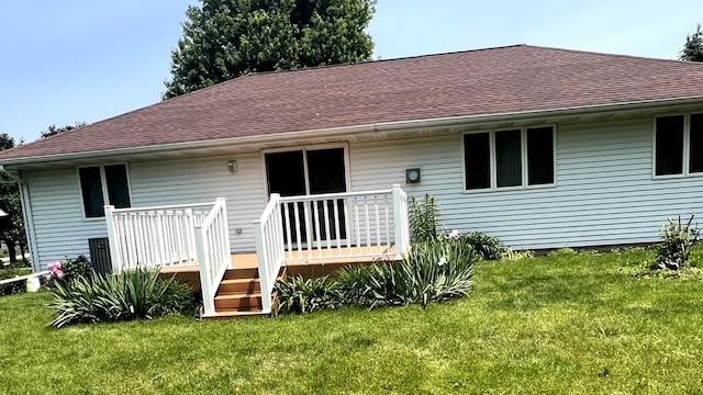 1231 Anthony Ln, Sandwich, IL 60548 - rear view of property with roof with shingles, a yard, and a deck