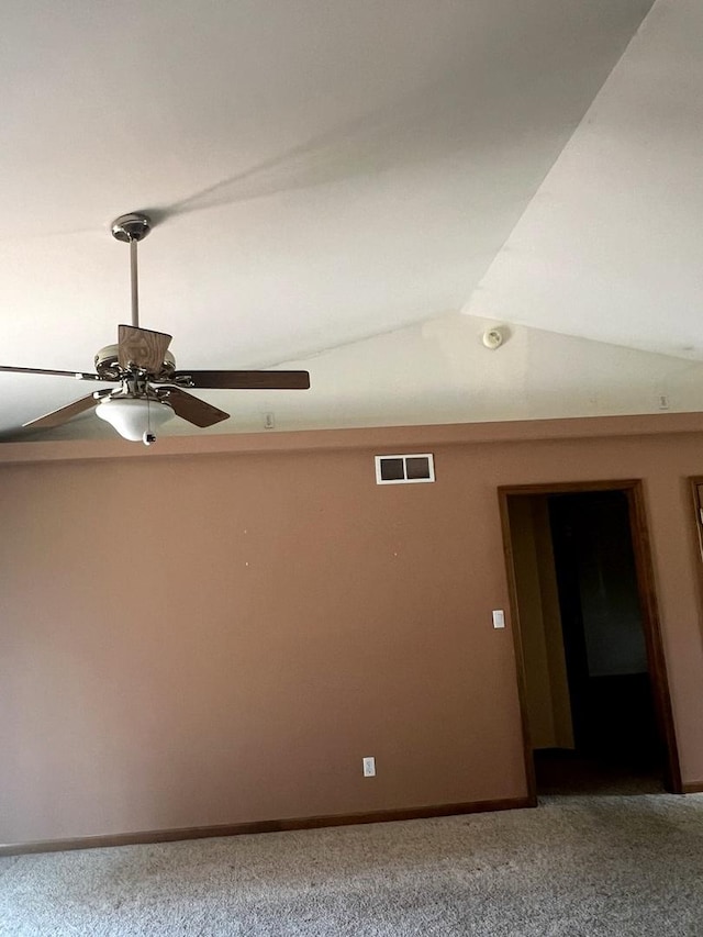 1231 Anthony Ln, Sandwich, IL 60548 - spare room featuring carpet floors, a ceiling fan, vaulted ceiling, and baseboards