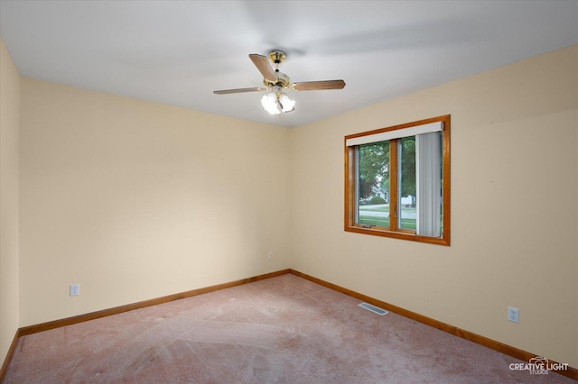 1231 Anthony Ln, Sandwich, IL 60548 - carpeted spare room featuring baseboards and a ceiling fan