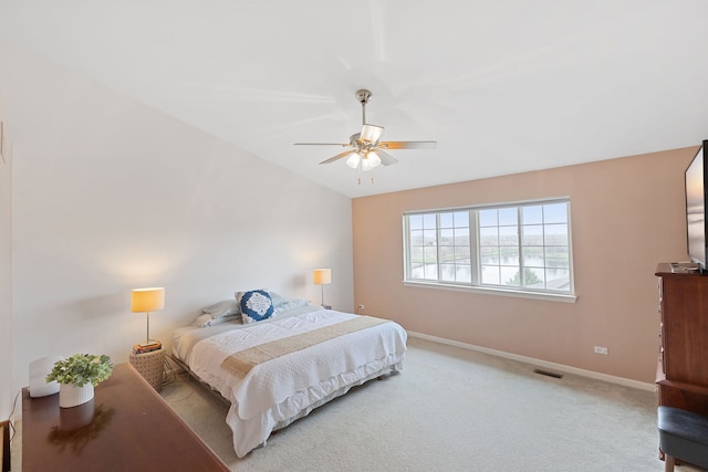bedroom featuring baseboards, ceiling fan, carpet flooring, and visible vents