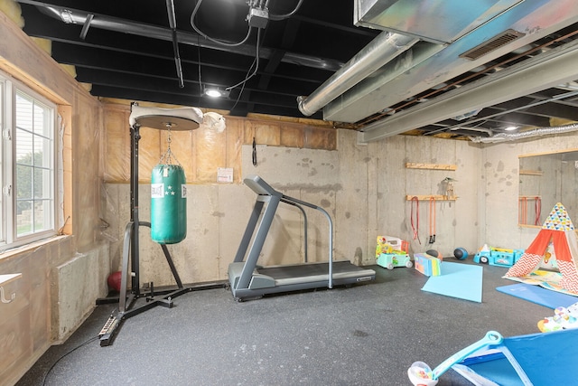 workout area featuring visible vents