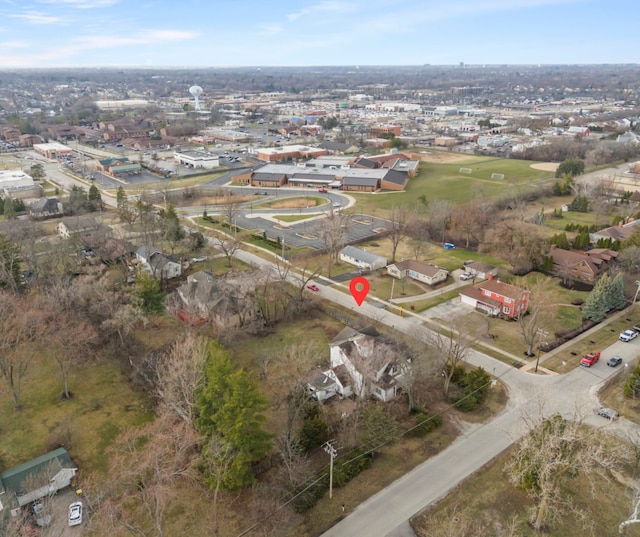 birds eye view of property with a residential view