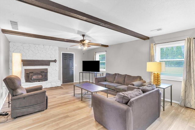 3104 Park Haven Blvd, Danville, IL 61832 - living area featuring beam ceiling, light wood-style floors, baseboards, and ceiling fan