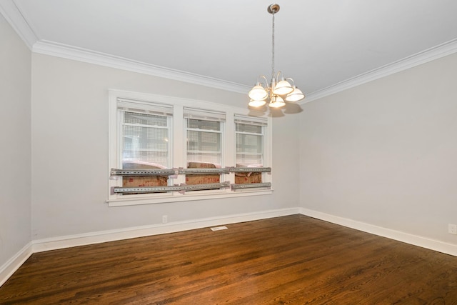empty room featuring baseboards, ornamental molding, a notable chandelier, and dark wood-style floors