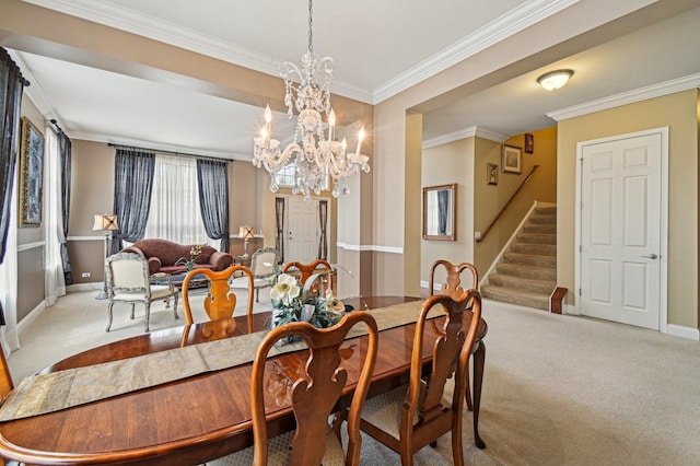 1037 Moray Dr, Inverness, IL 60010 - carpeted dining area featuring baseboards, crown molding, a chandelier, and stairs