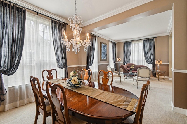 1037 Moray Dr, Inverness, IL 60010 - carpeted dining room featuring a wealth of natural light, baseboards, ornamental molding, and an inviting chandelier