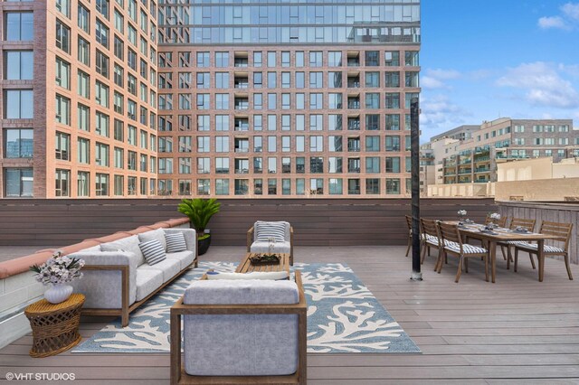 29 N Morgan St Unit Ph, Chicago, IL 60607 - wooden deck featuring outdoor dining area and outdoor lounge area