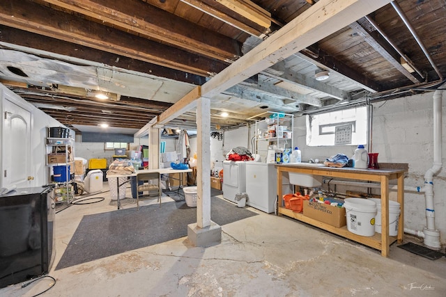 unfinished below grade area with independent washer and dryer