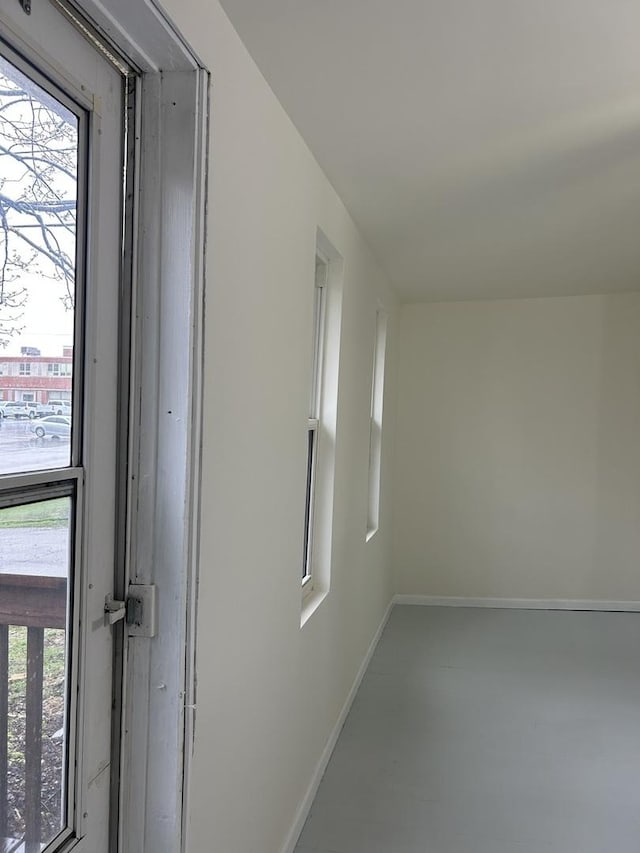 interior space featuring baseboards