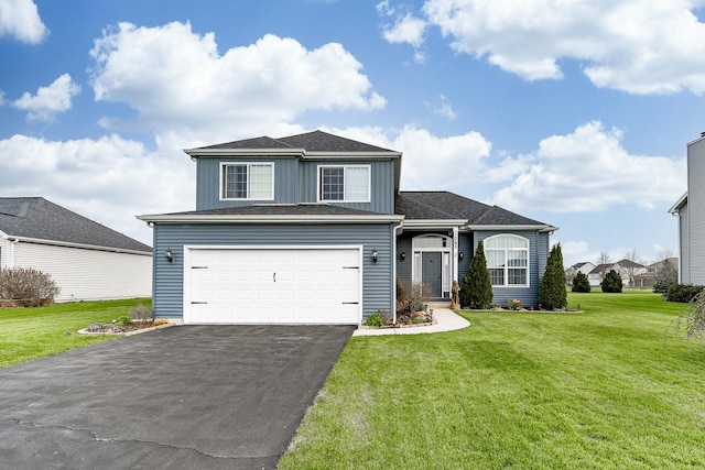 traditional-style home featuring board and batten siding, driveway, a front yard, and a garage