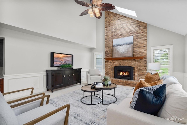 1454 Rill Ct, Naperville, IL 60565 - living area featuring high vaulted ceiling, ceiling fan, a wainscoted wall, and a brick fireplace